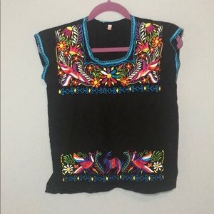 Mexican traditional embroidery blouse